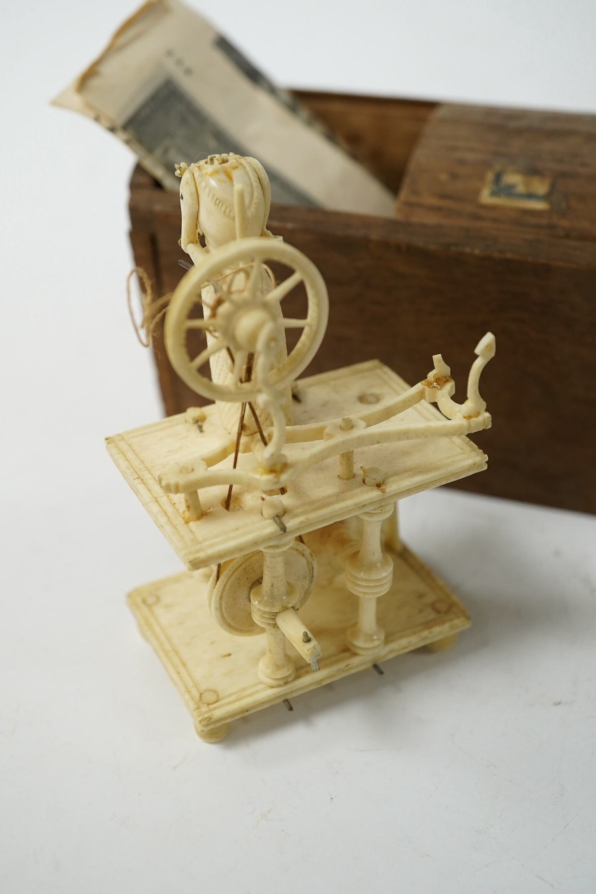 A 19th century prisoner of war carved bone Spinning Jenny, boxed. Condition - poor